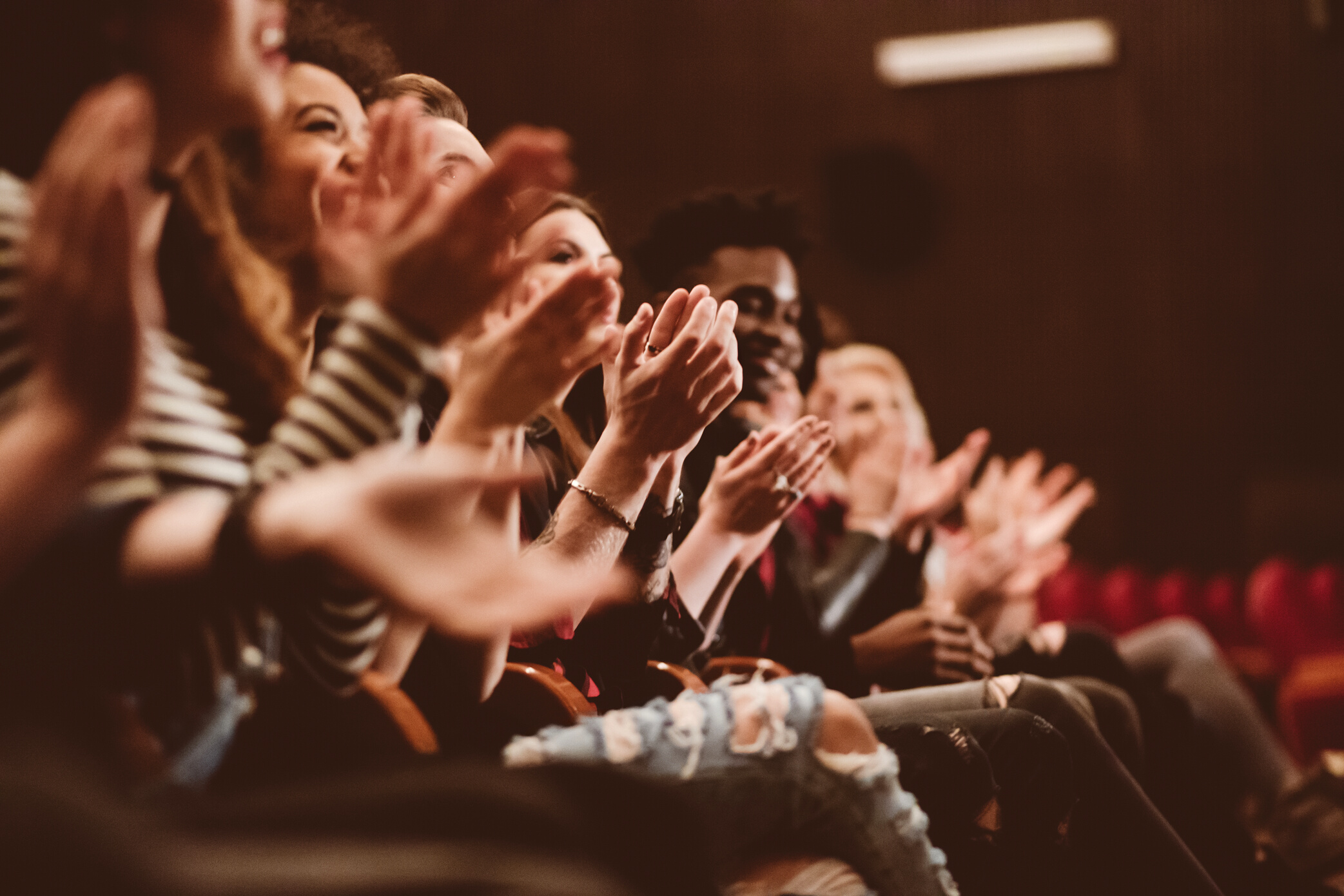 Audience applauding in the theater